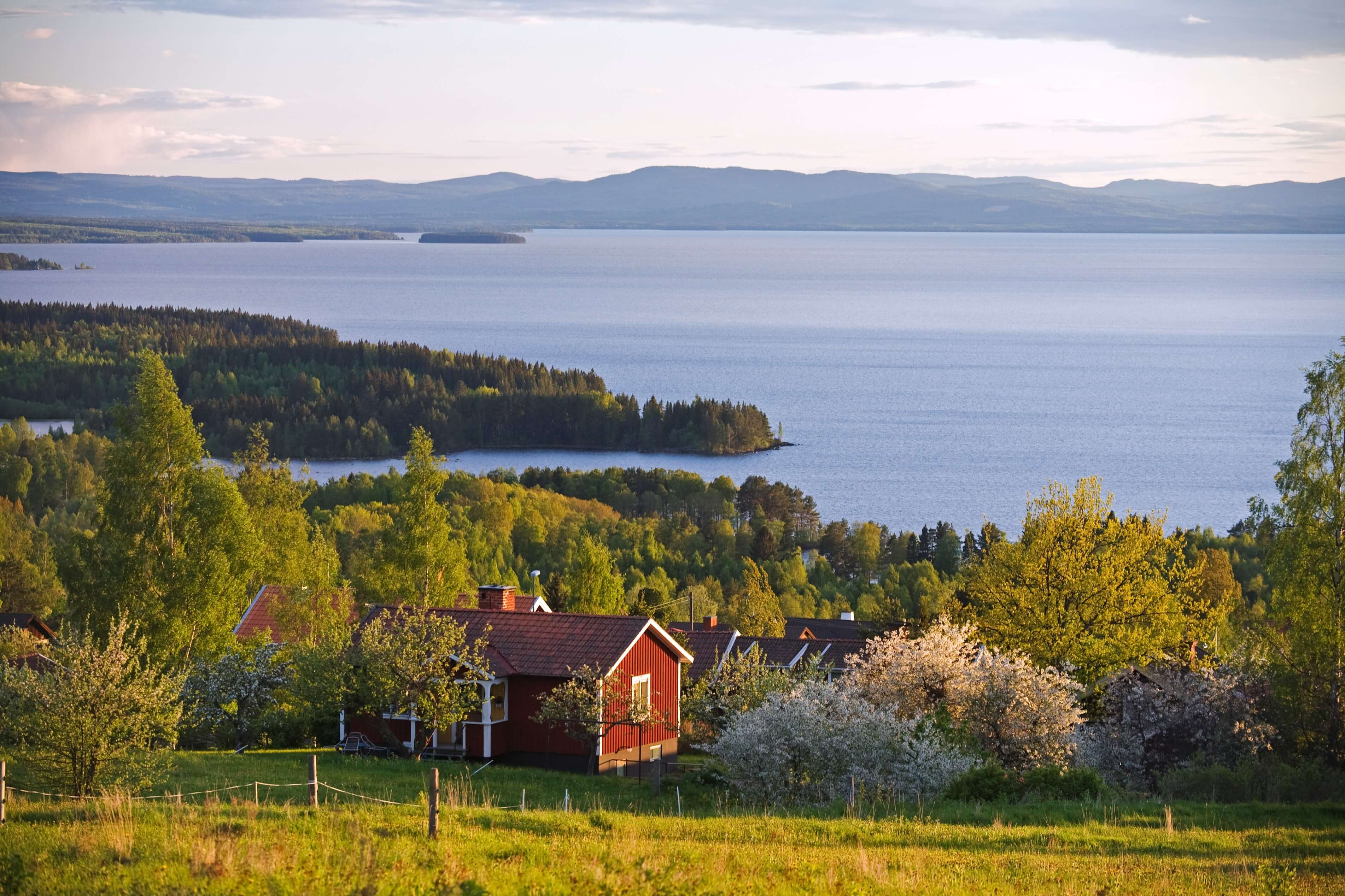 Rättvik landskap med rött hus